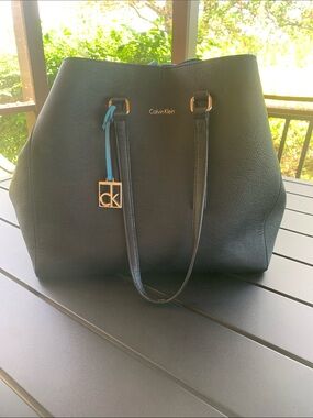 Calvin Klein Black Tote with Gold CK Charm and Blue Accent